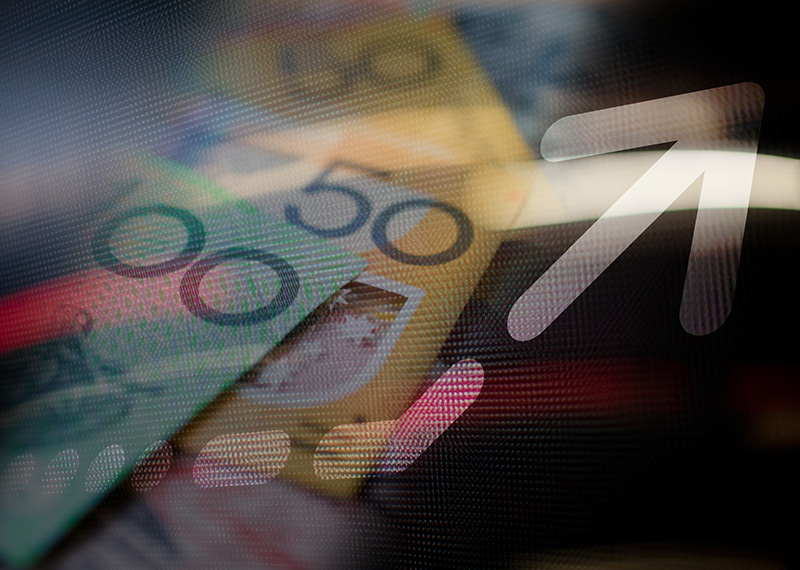 Australian bank notes in the background. An arrow pointing upwards in the foreground. 