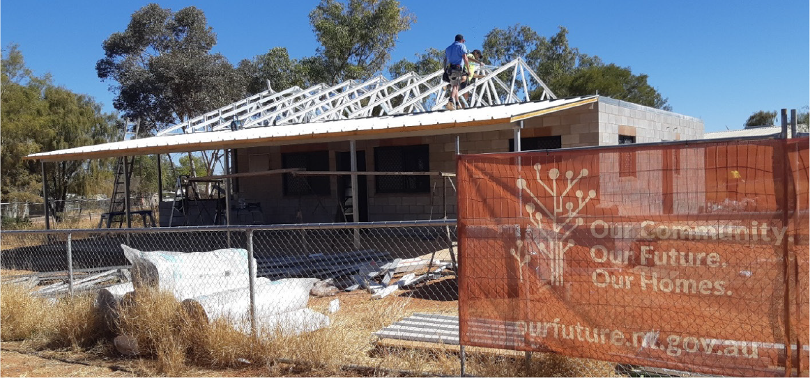 A photo of a brick house under construction in the Galiwin’ku community as part of the Our Community, Our Future, Our Homes program.