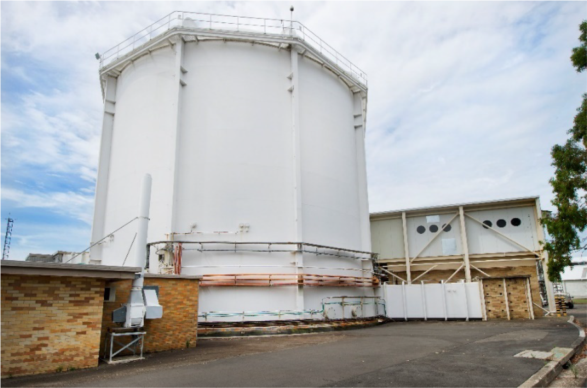 A photo of the exterior of the High Flux Australian Reactor at ANSTO’s Lucas Heights campus. 