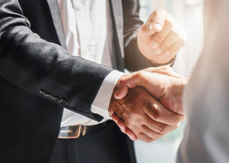 Business background of businessman having handshake photo
